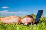 young beautiful girl sleep on laptop outdoor young beautiful girl sleep on laptop outdoor